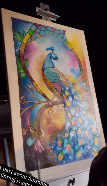 Peacock painting in a stained-glass style arch